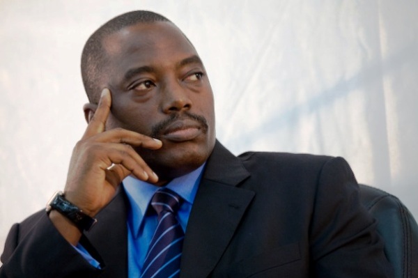 President Kabila looks on during signature ceremonies.